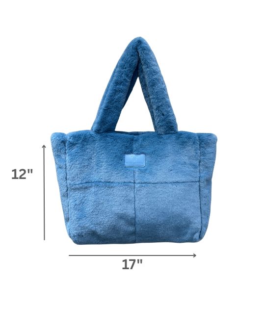 Plush faux fur tote bag with padded handles, zippered top, and spacious interior – designed for cozy winter outings and everyday comfort. Soft, lightweight, and stylish, perfect for carrying essentials in cold weather. A chic and functional piece from Tales of Totes – standing out from Indian brands like Zouk, Chumbak, and Miraggio with unique textures and winter-ready fashion flair."
