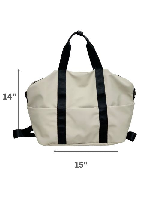 Beige bag with black straps and measurements on a white backgroundA unisex duffel tote bag with a sleek, minimal design featuring two vertical straps, dual carry handles, an adjustable shoulder strap, and side pockets. Spacious enough for travel or daily use, crafted from durable, water-resistant material with a zippered top closure. Ideal for college, gym, or casual outings.
