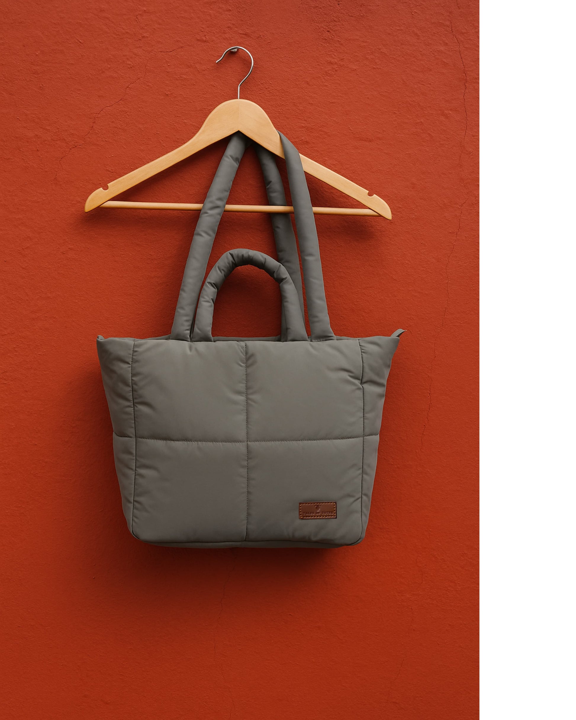 Stylish quilted puffer tote bag with padded handles and box-stitched detailing – ultra-lightweight, roomy, and perfect for everyday use. Ideal for college, shopping, or casual streetwear looks. A trendy fashion essential from Tales of Totes, offering cozy-chic appeal beyond standard canvas bags on Indian platforms like Myntra, Flipkart, and Amazon."