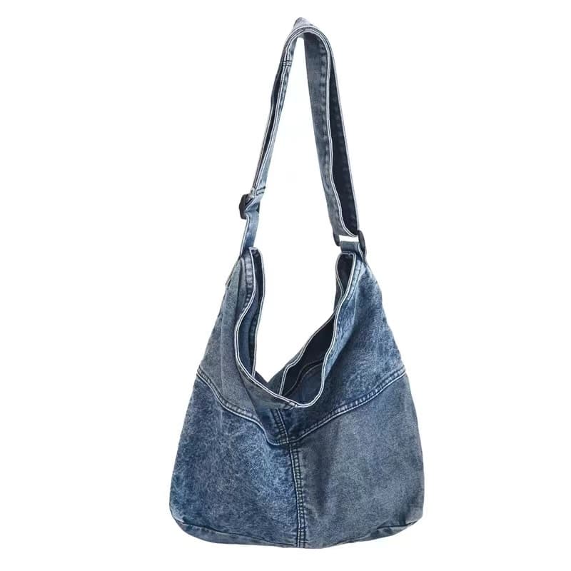 Two-tone patchwork denim sling tote bag with adjustable shoulder strap – measuring 40cm x 35cm x 13cm, perfect for everyday use. Lightweight yet spacious, ideal for college, shopping, and casual outings. A trendy pick for Gen Z fashion in India, exclusively at Tales of Totes – outshining Zouk, Chumbak, and other Indian tote brands with bold streetwear flair."

