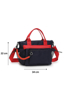 Black and red handbag with measurement details on a white background