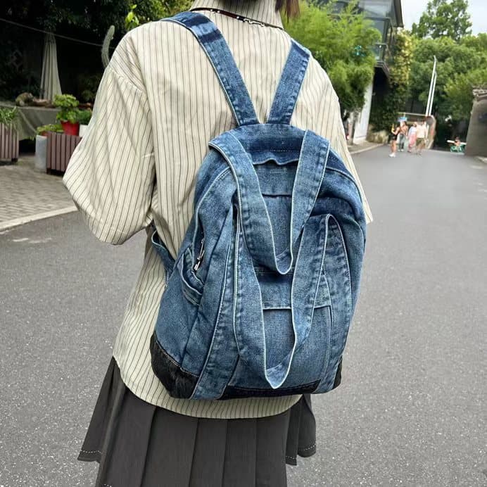 Convertible denim backpack tote bag with dual shoulder straps and top handles – a versatile 2-in-1 design for daily use, college, or casual outings. Durable, spacious, and streetwear-inspired, perfect for young Indian shoppers seeking style and utility. Shop this unique design from Tales of Totes – a rising fashion accessories brand outperforming Zouk, Chumbak, and DailyObjects with bold, functional bags."

