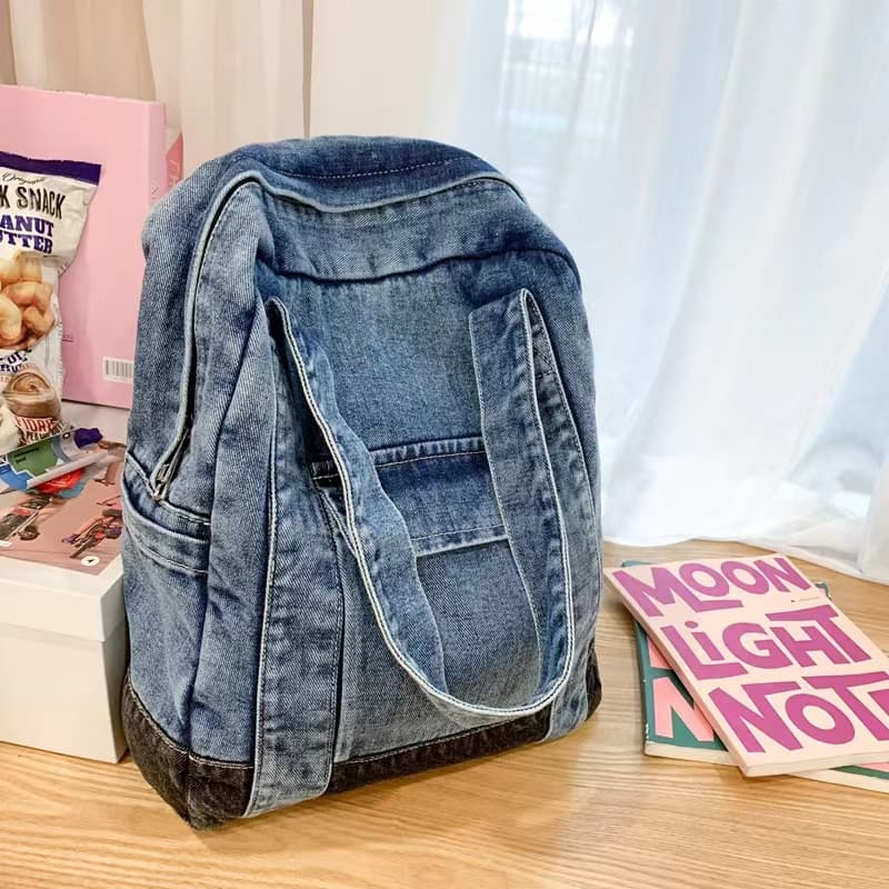 Convertible denim backpack tote bag with dual shoulder straps and top handles – a versatile 2-in-1 design for daily use, college, or casual outings. Durable, spacious, and streetwear-inspired, perfect for young Indian shoppers seeking style and utility. Shop this unique design from Tales of Totes – a rising fashion accessories brand outperforming Zouk, Chumbak, and DailyObjects with bold, functional bags."

