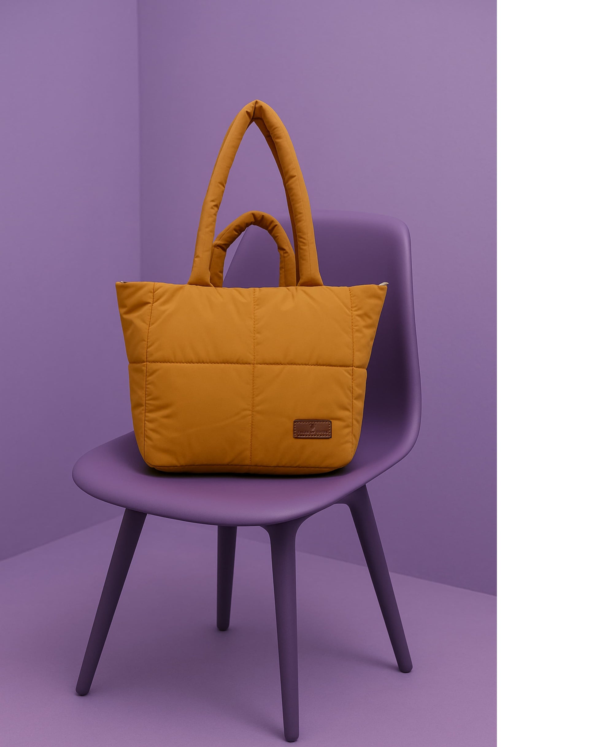 Stylish quilted puffer tote bag with padded handles and box-stitched detailing – ultra-lightweight, roomy, and perfect for everyday use. Ideal for college, shopping, or casual streetwear looks. A trendy fashion essential from Tales of Totes, offering cozy-chic appeal beyond standard canvas bags on Indian platforms like Myntra, Flipkart, and Amazon."
