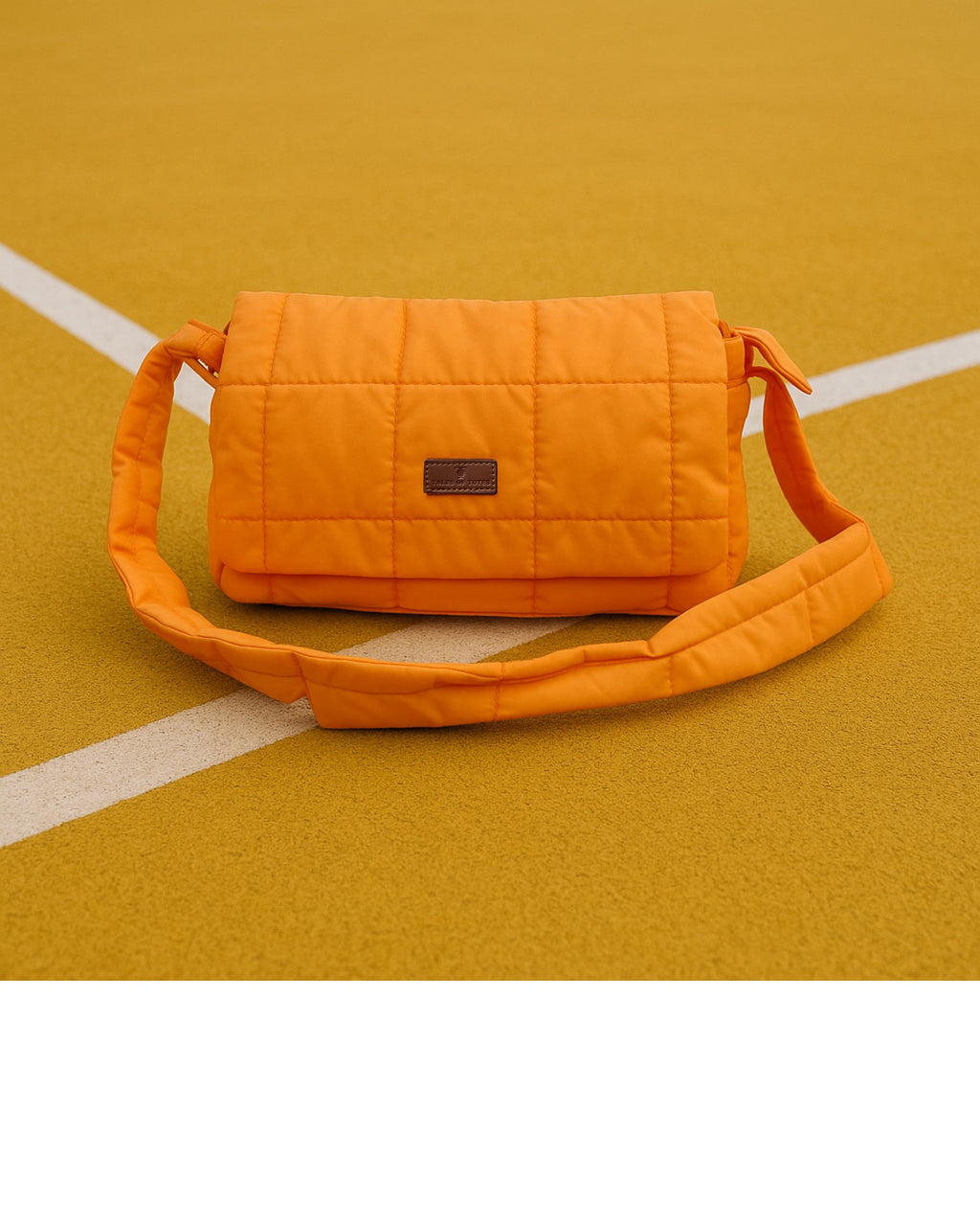 Quilted shoulder bag with a padded design, knotted strap detail, and soft structured silhouette – lightweight, functional, and perfect for daily use or casual outings. Compact yet spacious, ideal for carrying essentials in style. A statement accessory from Tales of Totes, offering cozy fashion-forward appeal for Indian shoppers.