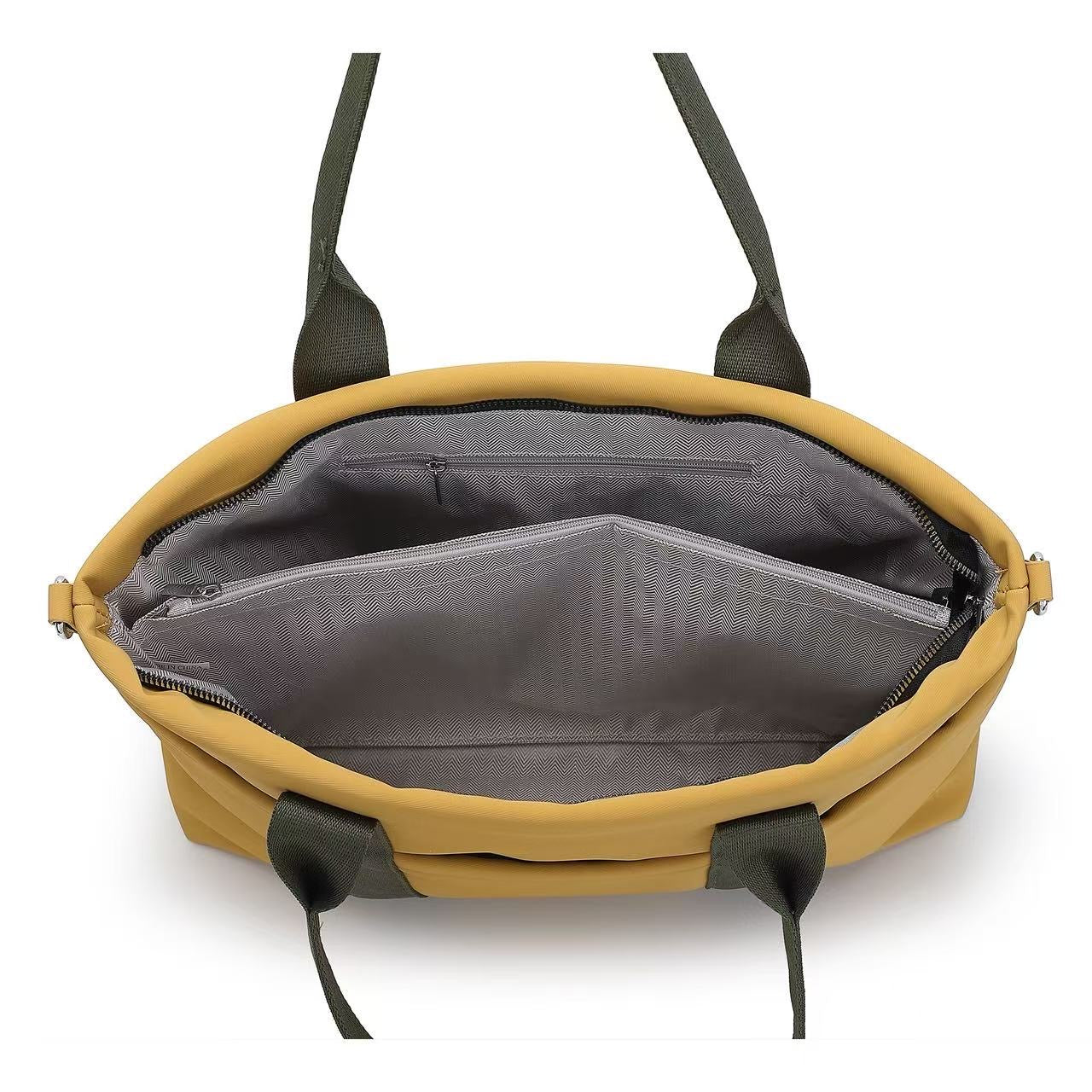 Open yellow bag with black straps on a white background