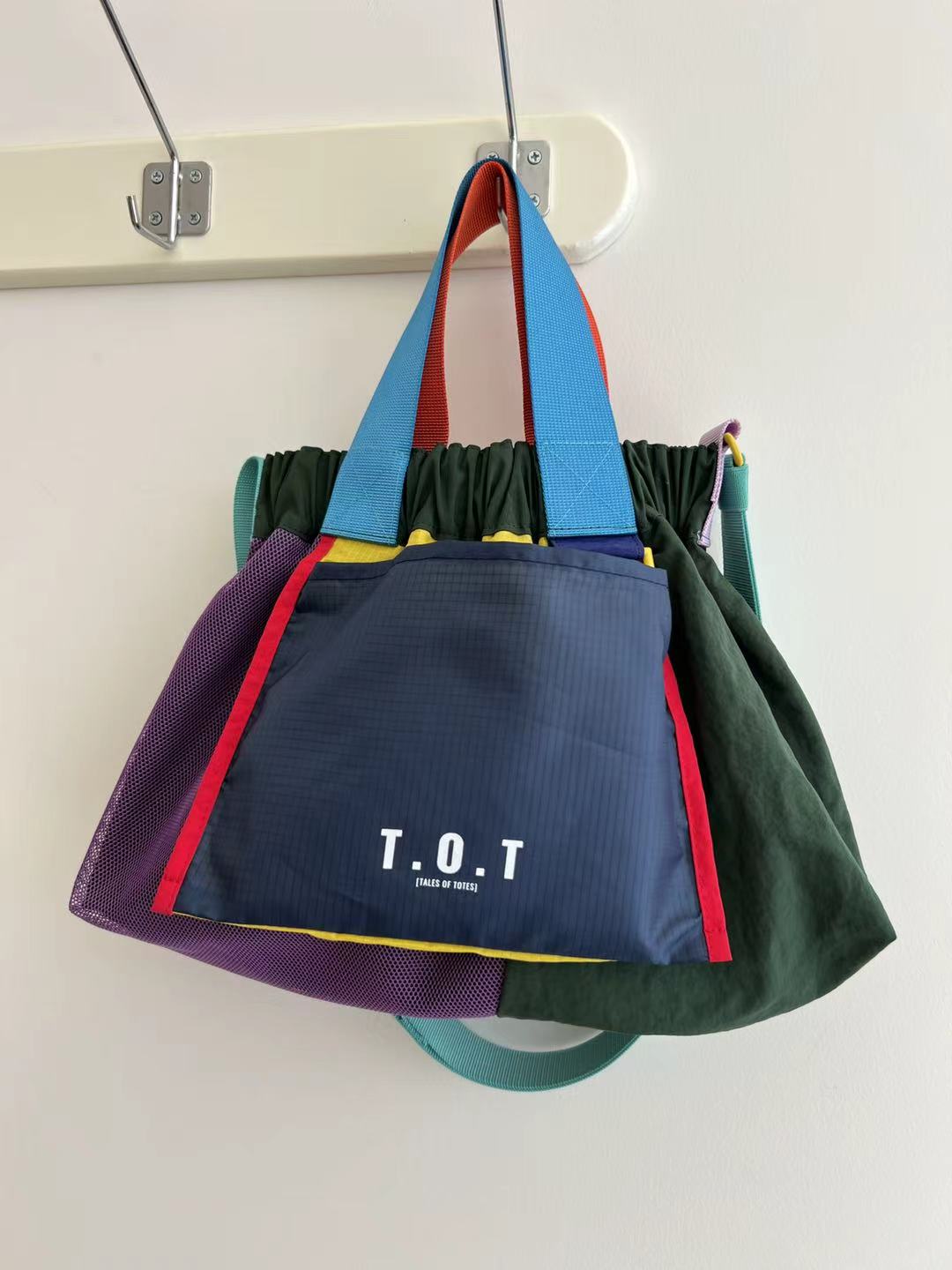 Trendy multi-color casual college tote bag with mesh detailing and adjustable straps.