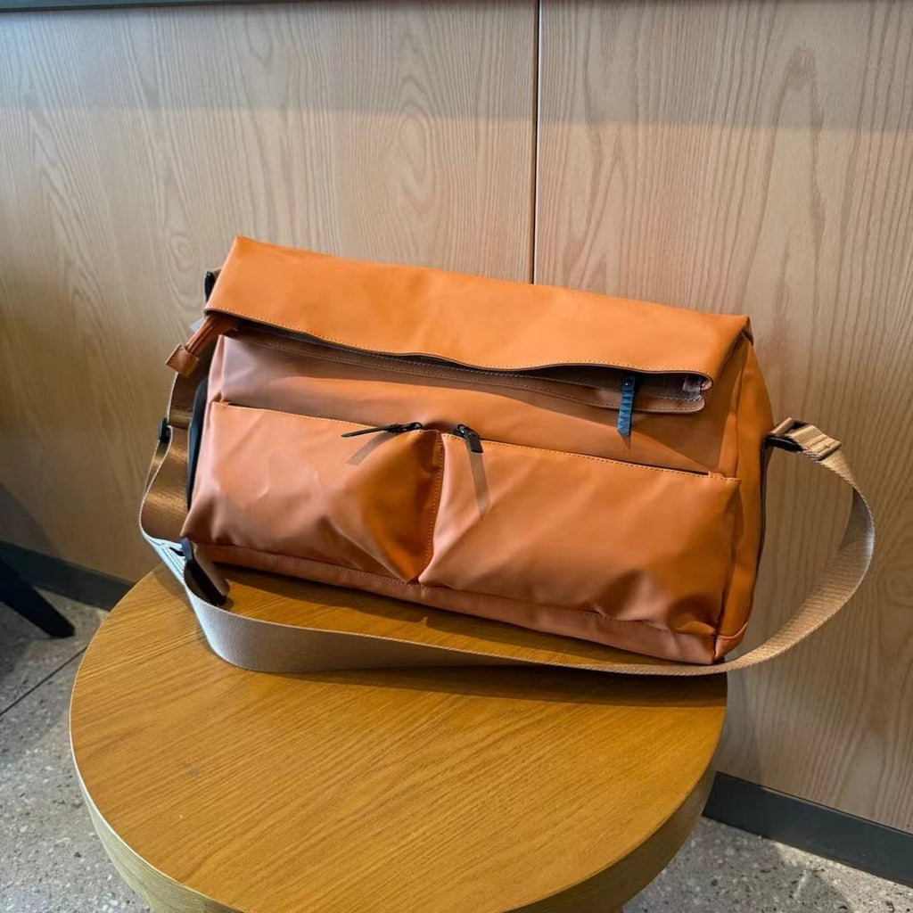Brown backpack on a white background,A padded, water-resistant shoulder bag with a roomy interior, zip closure, and adjustable strap, designed for everyday carry and positioned as a stylish alternative to popular Indian brands like Zouk, Miraggio, Lavie, Caprese, and DailyObjects.