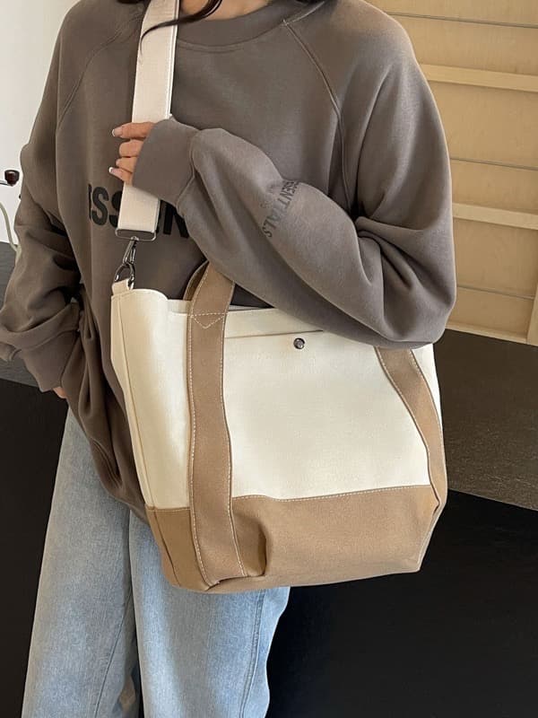 Canvas crossbody tote bag designed for everyday Indian life – lightweight, durable, and easy to style with streetwear or casual fits. Adjustable strap adds comfort and versatility. Perfect for college, errands, or city travel. Tales of Totes brings you better functionality and style than Zouk, Chumbak, and DailyObjects – fashion meets function at the right price."