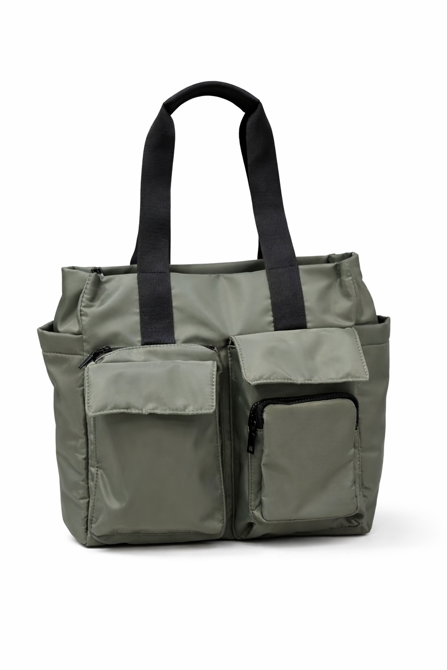 Green tote bag with black straps on a white background