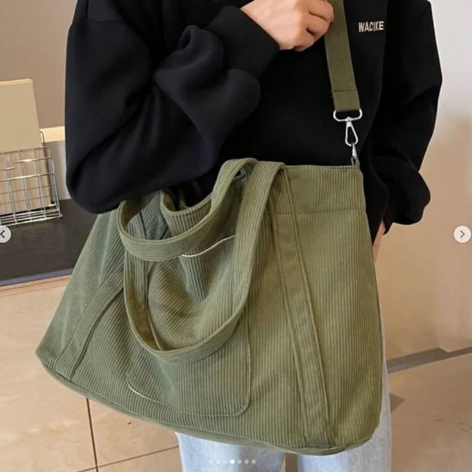 Trendy corduroy tote bag with dual handles and adjustable crossbody strap – soft-textured, oversized, and perfect for college, shopping, or everyday carry. Lightweight yet spacious, offering a casual streetwear aesthetic. A fashionable alternative from Tales of Totes – elevating Indian accessory trends beyond Zouk, Chumbak, and DailyObjects."

