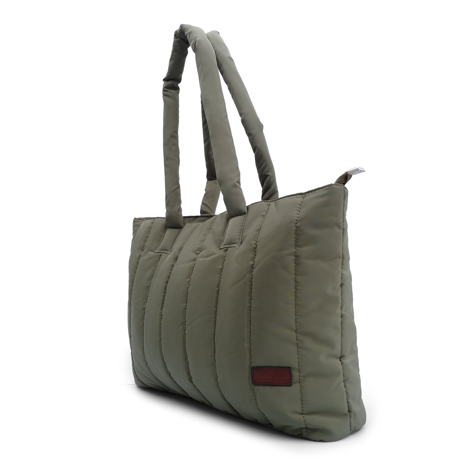 Trendy quilted puffer tote bag with soft padded handles and vertical stitch design – spacious, lightweight, and perfect for daily use, college, travel, or streetwear looks. A bold fashion essential from Tales of Totes, offering comfort and style beyond typical canvas bags on Indian marketplaces like Amazon, Flipkart, and Myntra. Competes with brands like Zouk, Chumbak, and DailyObjects."
