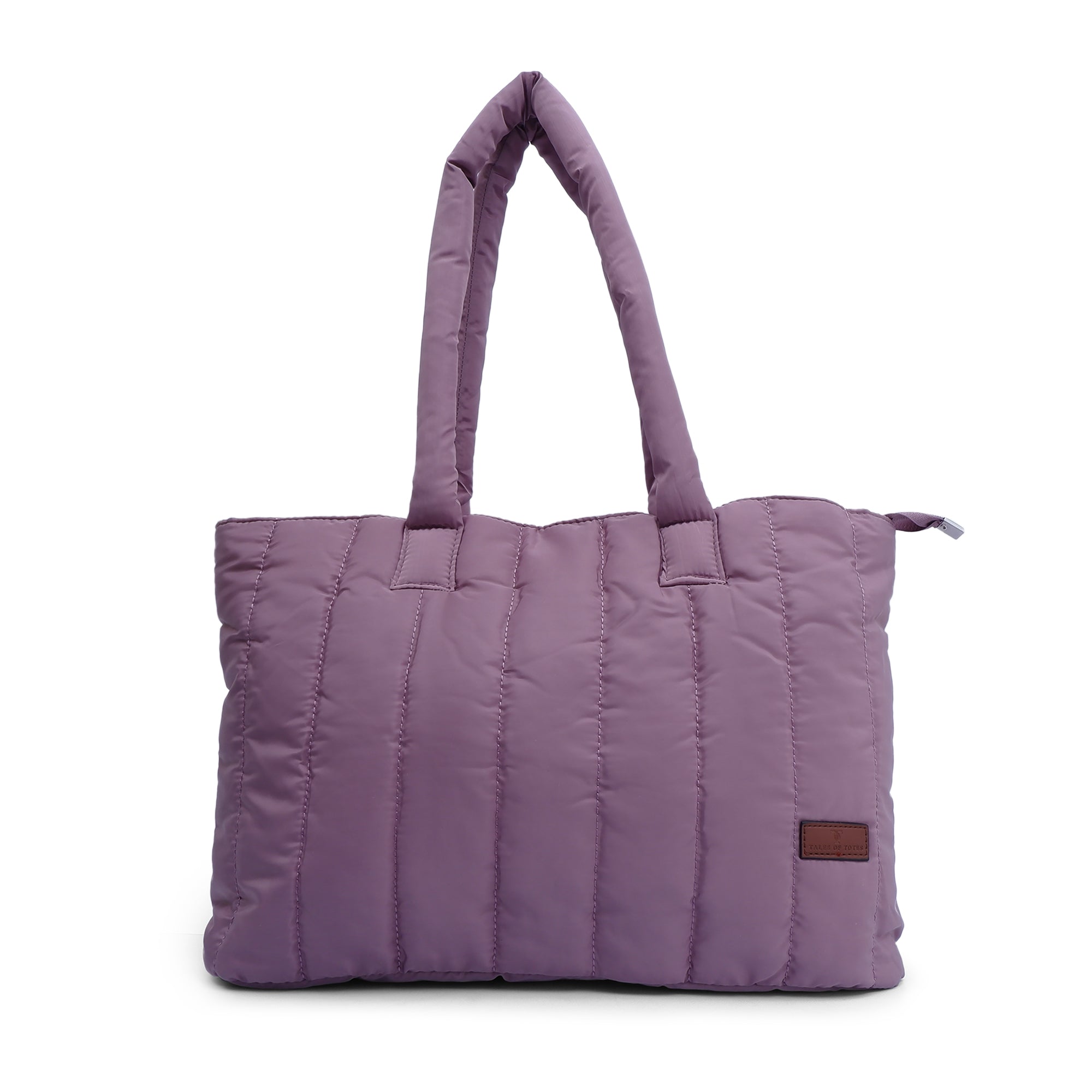 Trendy quilted puffer tote bag with soft padded handles and vertical stitch design – spacious, lightweight, and perfect for daily use, college, travel, or streetwear looks. A bold fashion essential from Tales of Totes, offering comfort and style beyond typical canvas bags on Indian marketplaces like Amazon, Flipkart, and Myntra. Competes with brands like Zouk, Chumbak, and DailyObjects."
