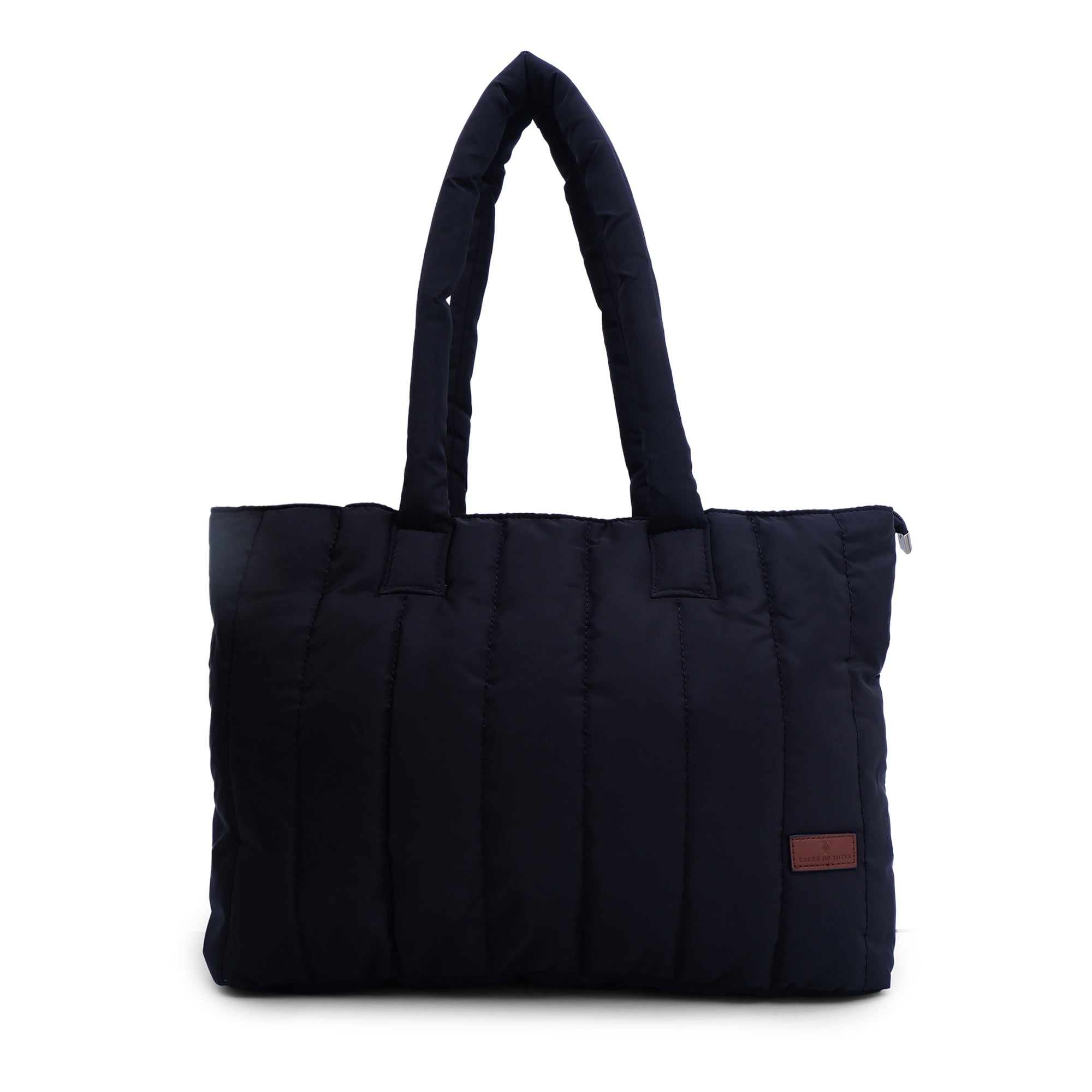 Trendy quilted puffer tote bag with soft padded handles and vertical stitch design – spacious, lightweight, and perfect for daily use, college, travel, or streetwear looks. A bold fashion essential from Tales of Totes, offering comfort and style beyond typical canvas bags on Indian marketplaces like Amazon, Flipkart, and Myntra. Competes with brands like Zouk, Chumbak, and DailyObjects."
