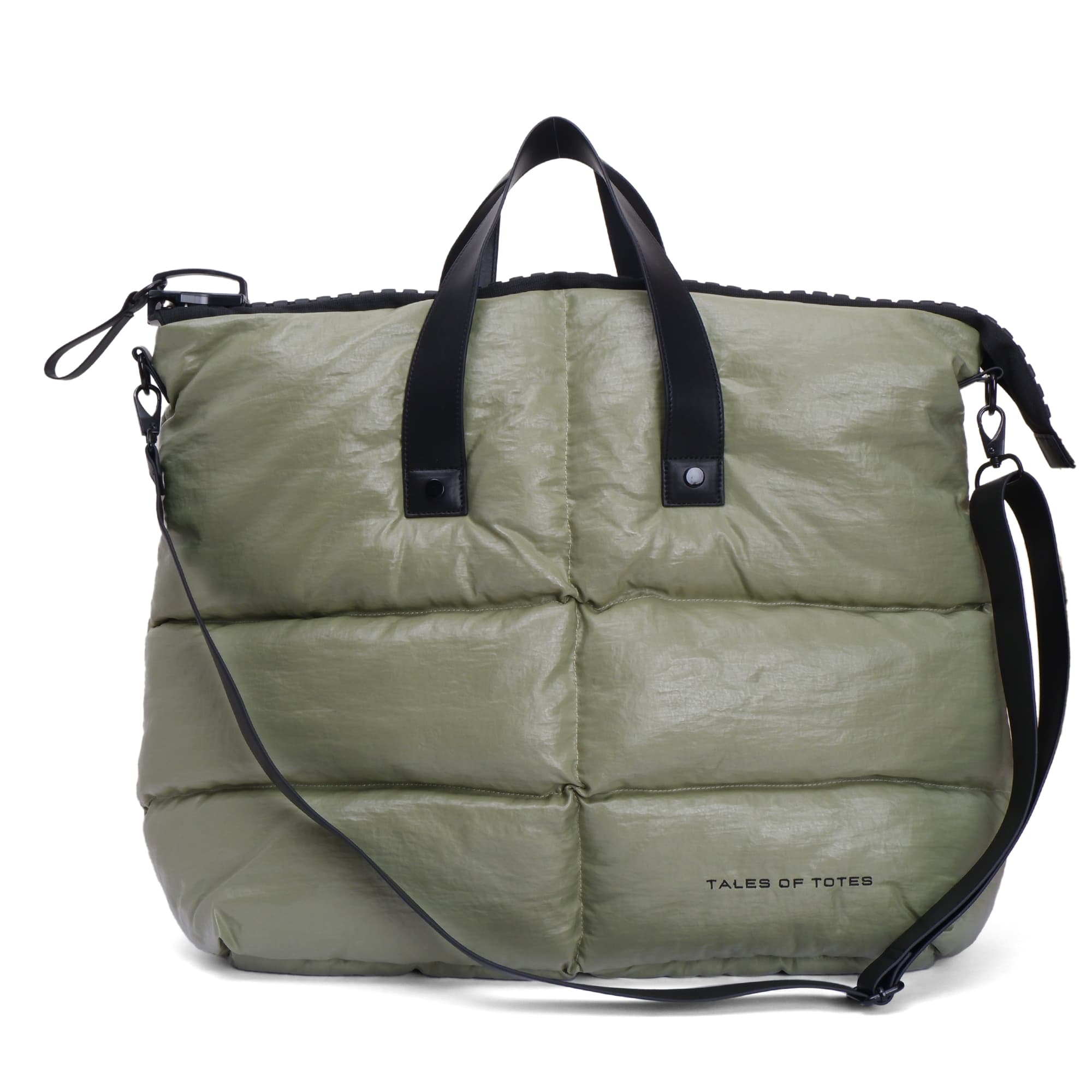 Green puffer bag with black straps on a white background