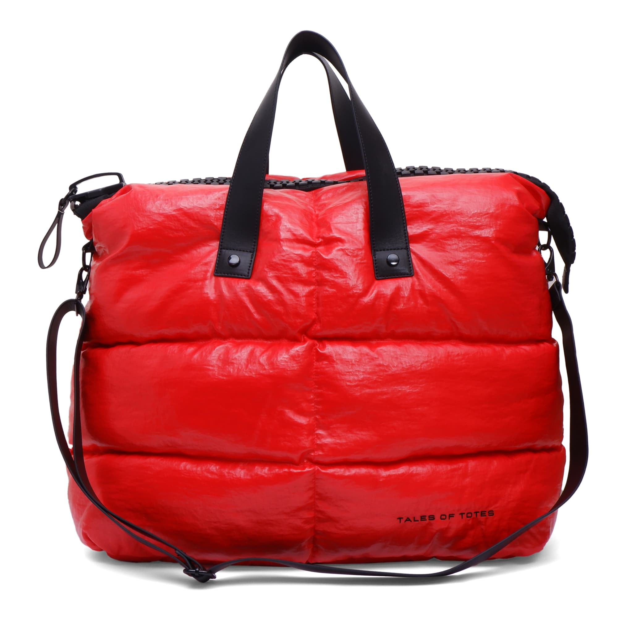 Red puffer bag with black straps on a white background