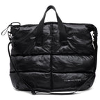 Black quilted duffel bag with shoulder strap on a white background