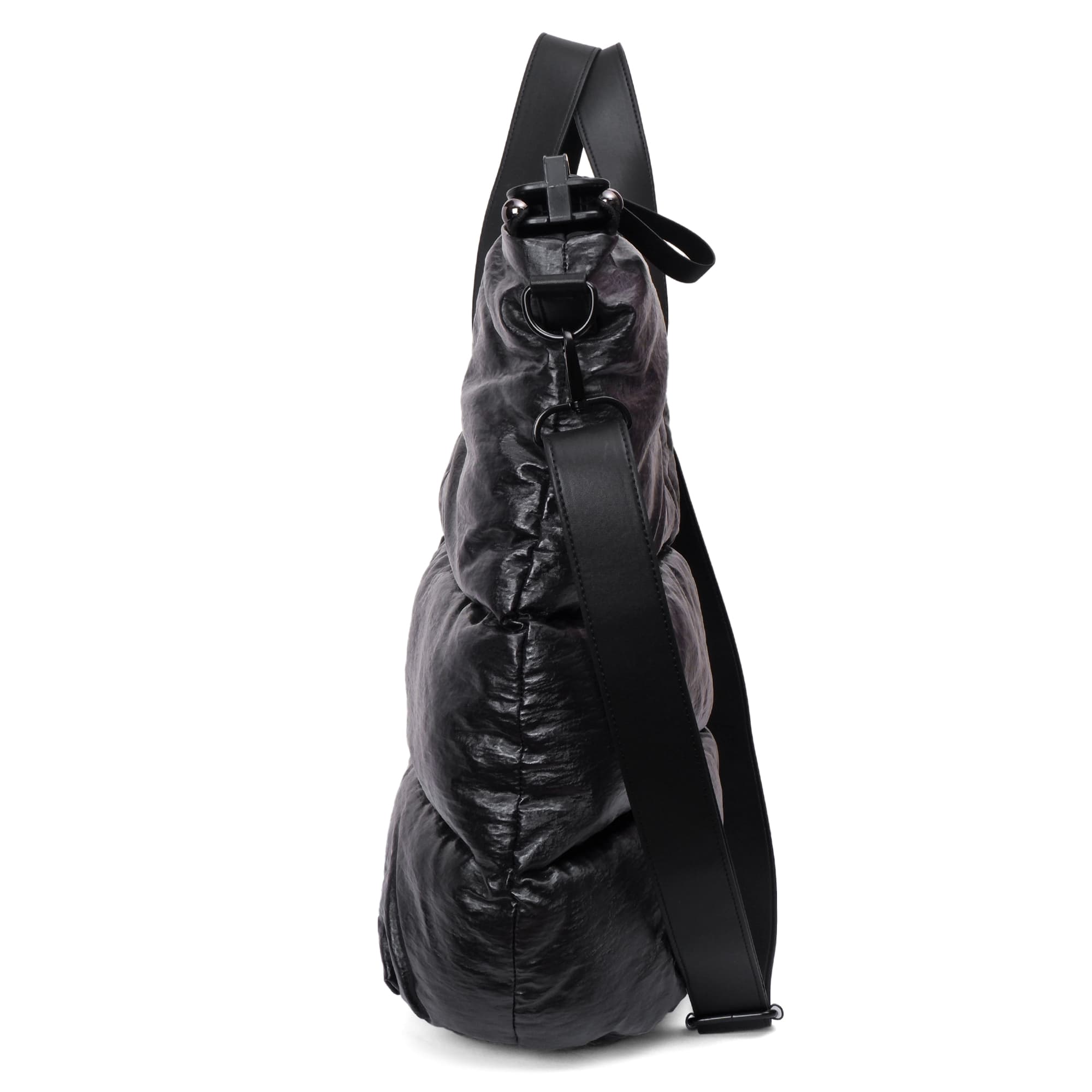 Black backpack with a strap on a white background
