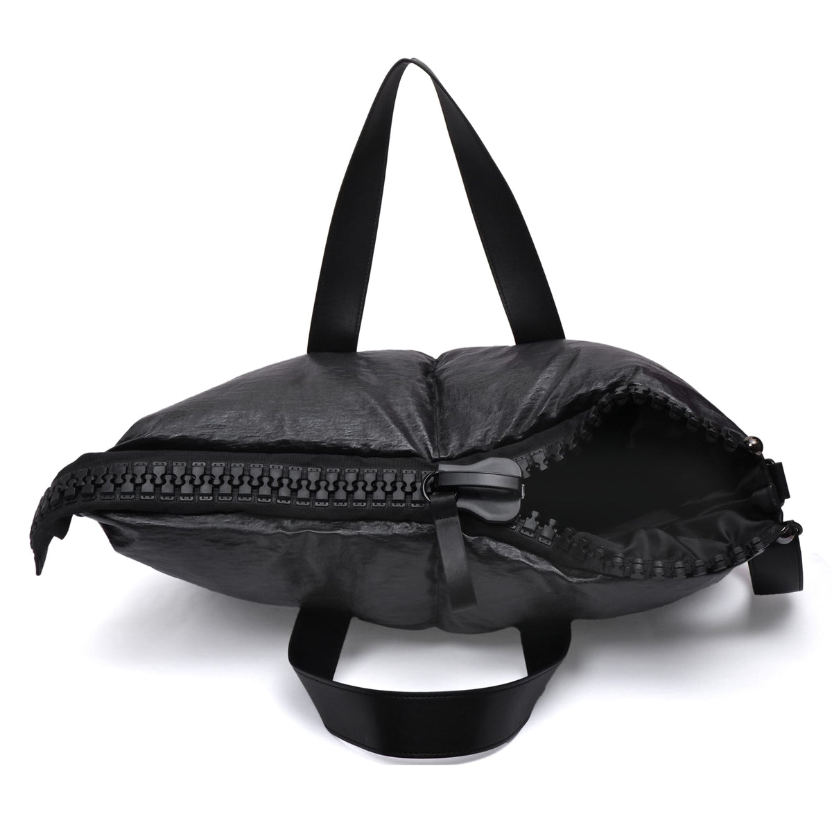 Black backpack with a zipper on a white background