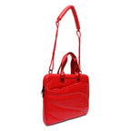 Red handbag with a strap on a white background