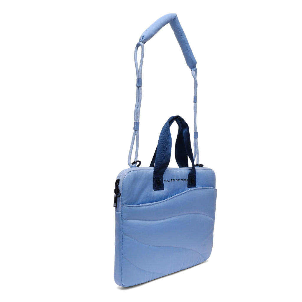 Blue laptop bag with a strap on a white background