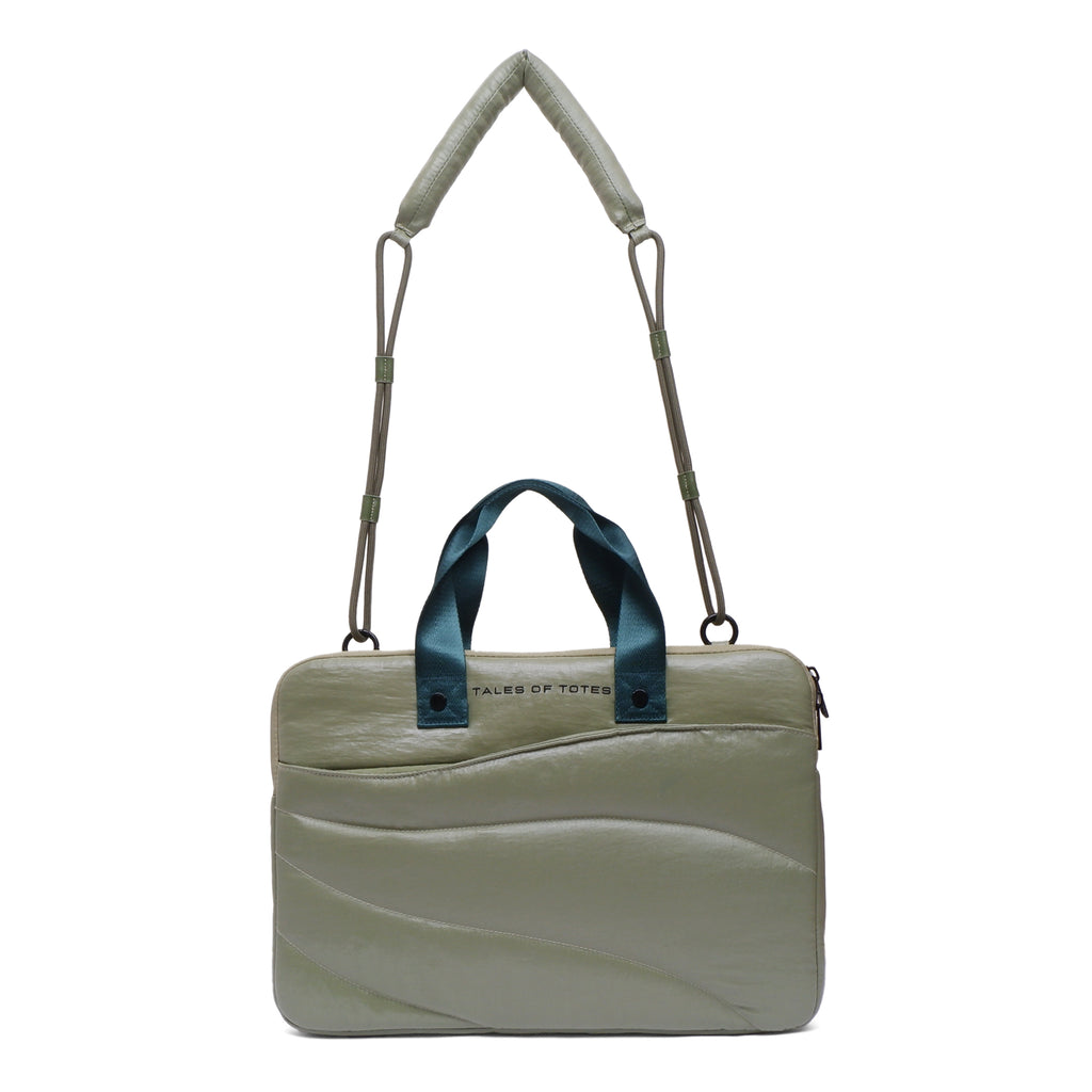 Light green handbag with a blue handle on a white background