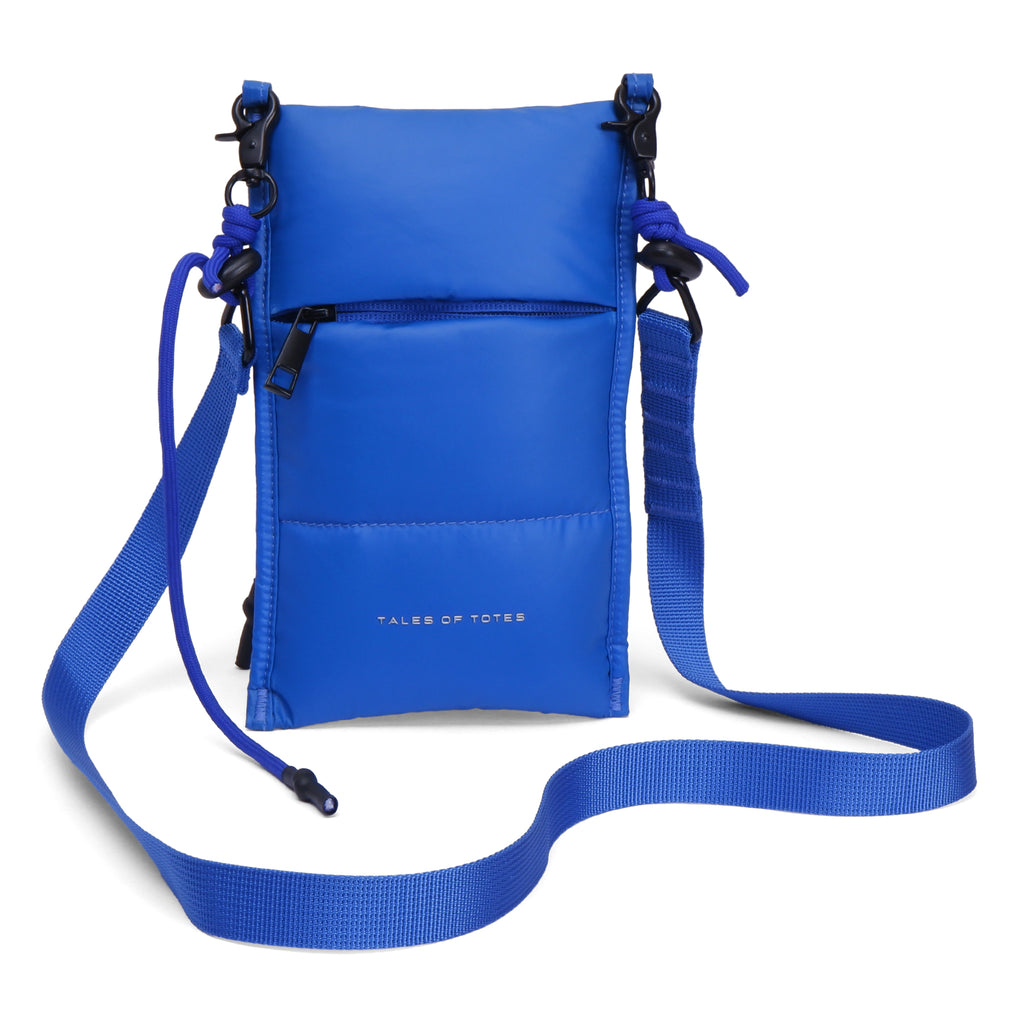 Blue crossbody bag with a strap on a white background