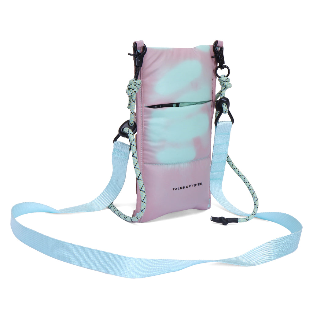 Pink and light blue crossbody bag with a strap on a white background