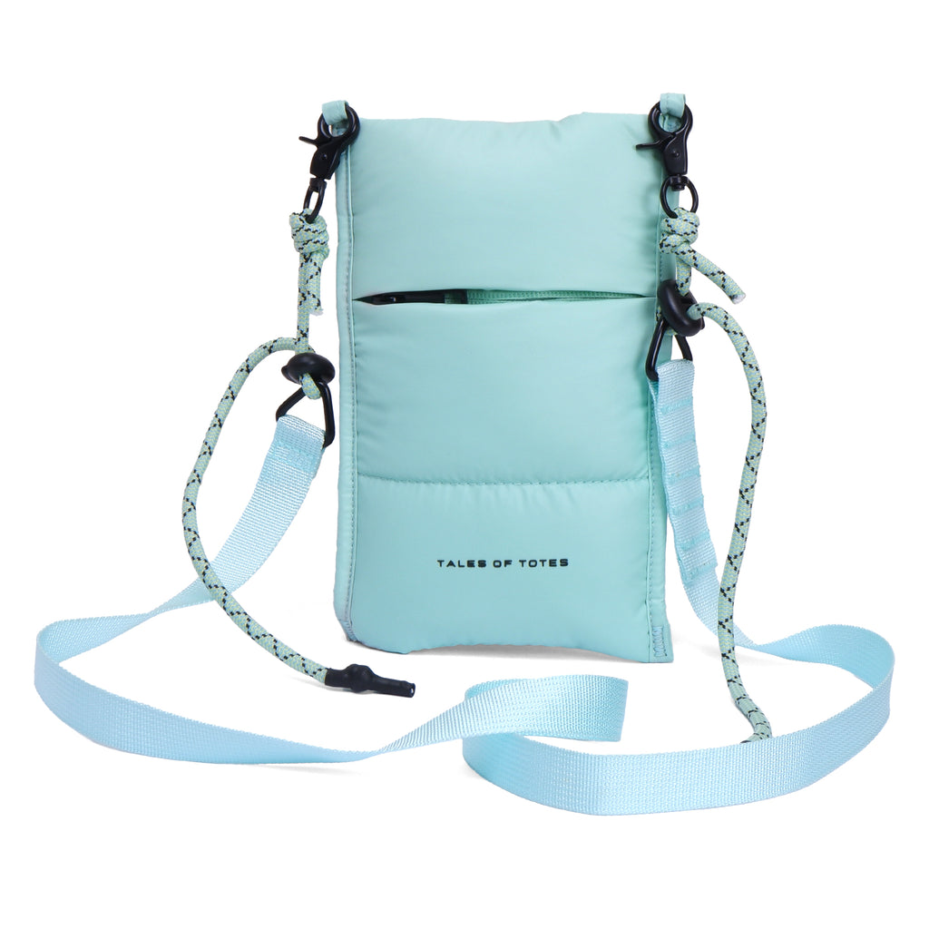Light blue crossbody bag with a strap on a white background