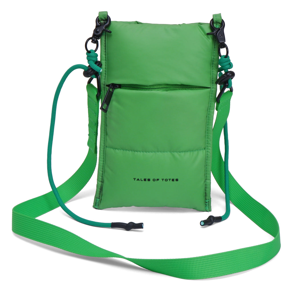 Green crossbody bag with a strap on a white background