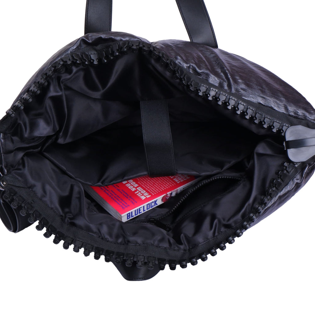 Black backpack with a visible brand name on a white background