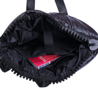 Black backpack with a visible brand name on a white background