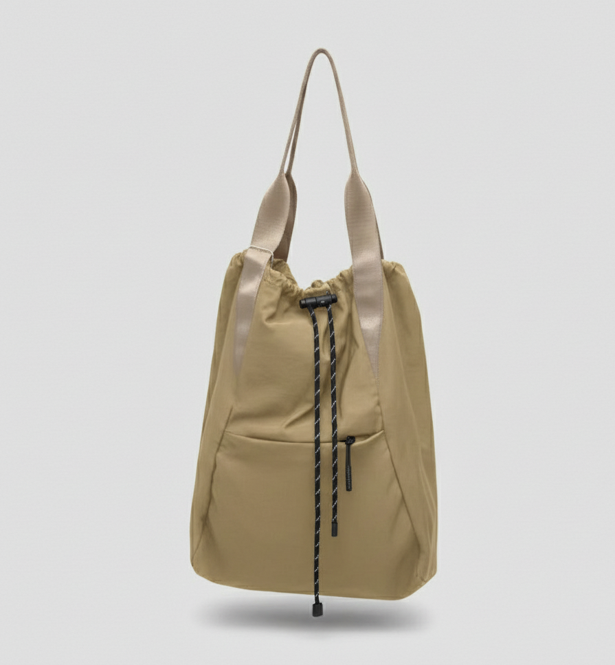 Beige backpack with drawstring on a light gray background,"Stylish khaki drawstring tote bag with multiple compartments and adjustable straps, perfect for daily use, shopping, and travel in India. Features include a secure zippered pocket, spacious main compartment, and comfortable shoulder straps. Ideal for fashion-conscious individuals seeking a versatile and trendy bag."