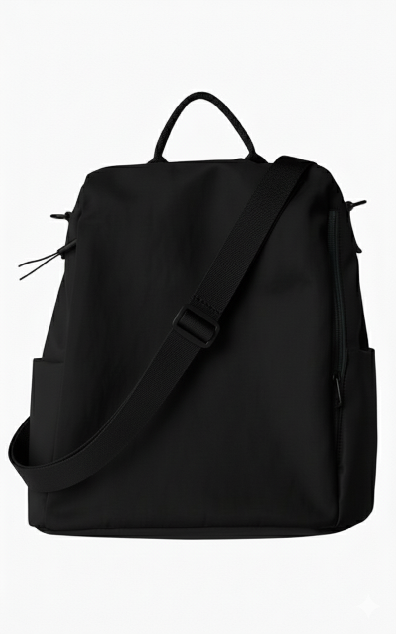 Black backpack on a white backgroundStylish travel backpack, durable everyday bag, versatile shoulder tote, convertible backpack purse, waterproof utility bag, modern casual rucksack, ergonomic daypack, trendy laptop bag, multi-functional women's backpack, secure anti-theft design, spacious college bag, fashion-forward accessory, urban commuter pack, comfortable carry-all, premium quality satchel, practical work bag, chic student backpack, easy-access travel essential, organized personal item, lightweight e