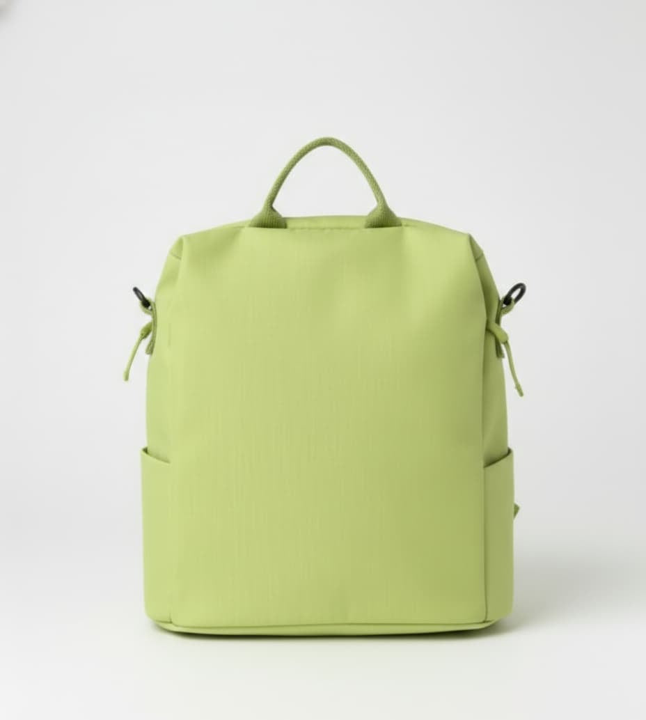 Green backpack on a white background