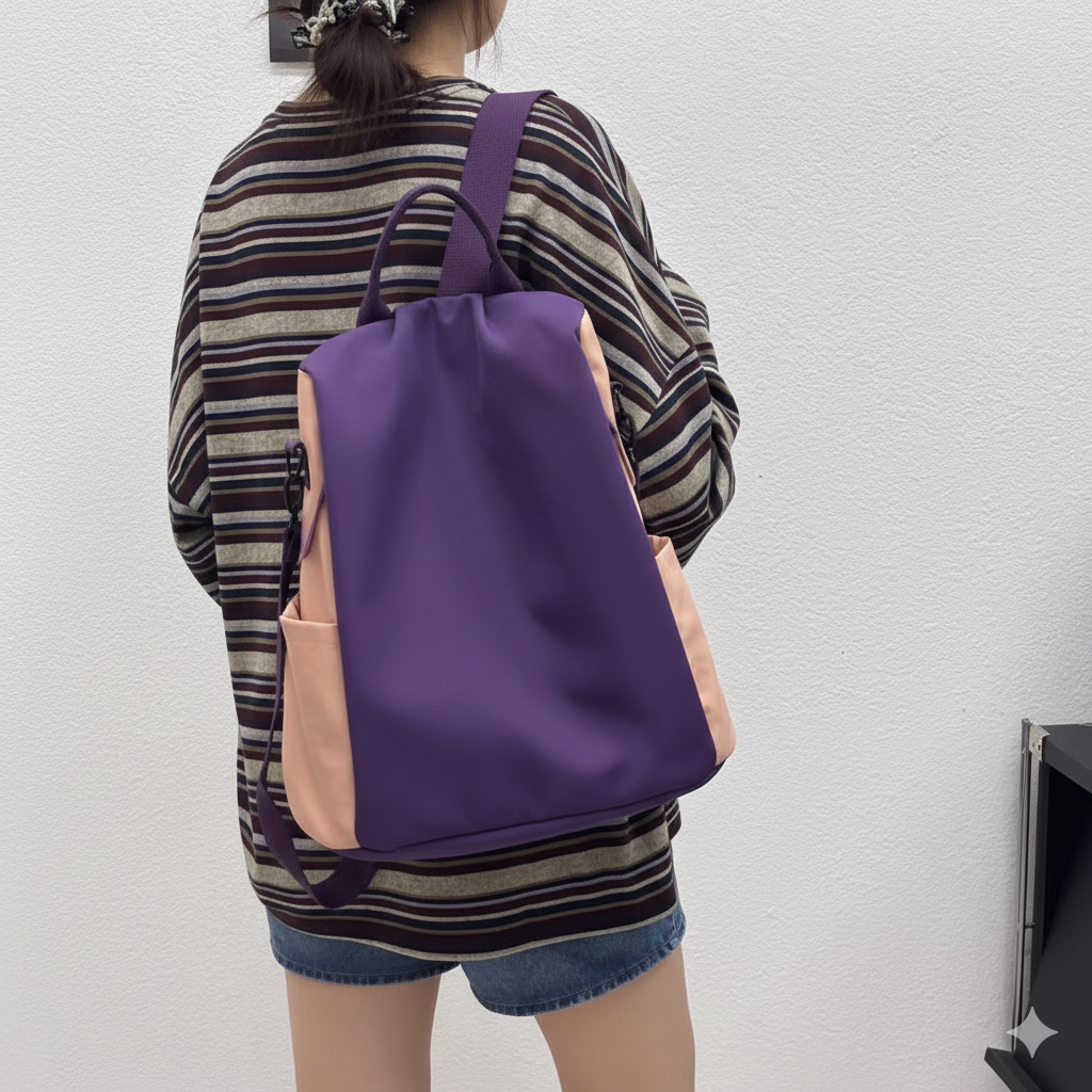 Person wearing a purple backpack with a pink front pocket on a plain background,Stylish travel backpack, durable everyday bag, versatile shoulder tote, convertible backpack purse, waterproof utility bag, modern casual rucksack, ergonomic daypack, trendy laptop bag, multi-functional women's backpack, secure anti-theft design, spacious college bag, fashion-forward accessory, urban commuter pack, comfortable carry-all, premium quality satchel, practical work bag, chic student backpack, easy-access travel essen