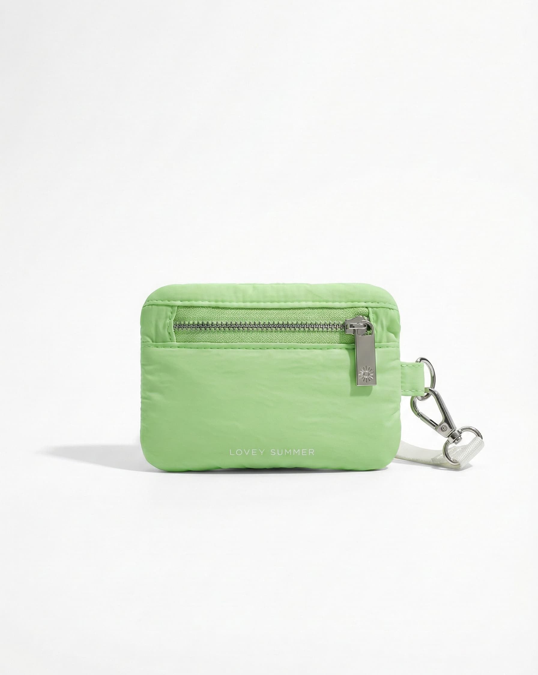 Green pouch with a zipper and keychain on a white background