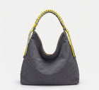 A dark gray crinkled leather hobo bag with a braided yellow and gray shoulder strap, shown against a plain white background.