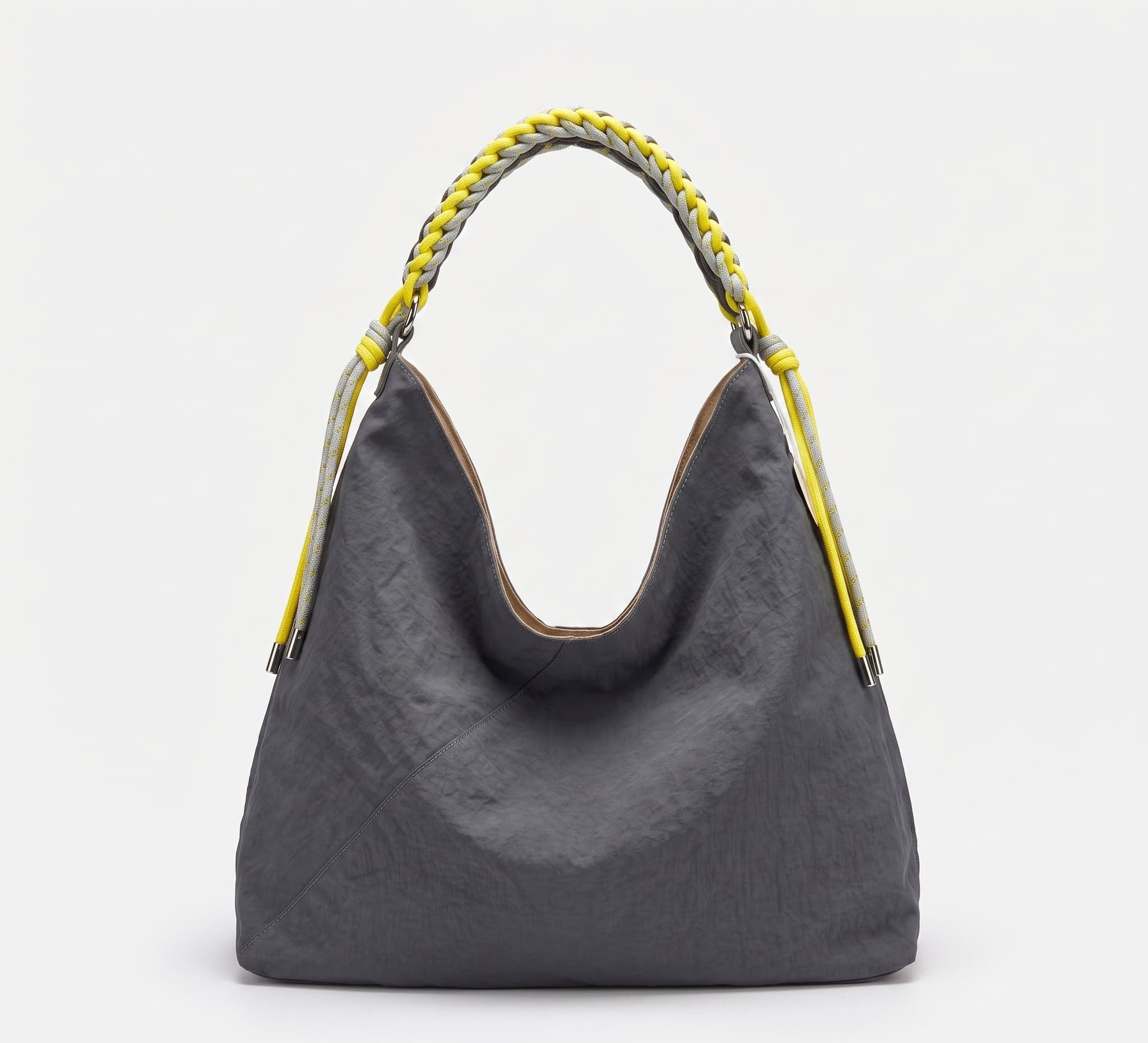 A dark gray crinkled leather hobo bag with a braided yellow and gray shoulder strap, shown against a plain white background.