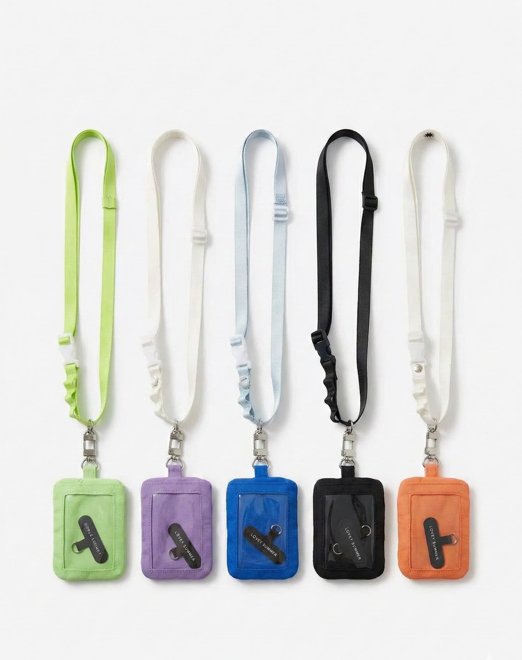 Set of colorful lanyards with attached card holders on a white background
