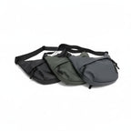 Three waist bags in black, green, and gray on a white backgroundA stylish, waterproof black nylon crossbody bag for men and women, perfect for travel, college, and daily use. Featuring a sleek design with multiple compartments, this unisex sling bag offers premium quality and durability. Ideal for the urban lifestyle, it's a versatile shoulder bag that blends fashion and function, making it a must-have accessory for trendsetters in India. #CrossbodyBag #NylonBag #SlingBag #UnisexFashion #TravelEssentials #C
