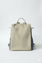 Beige and navy backpack on a white backgroundStylish travel backpack, durable everyday bag, versatile shoulder tote, convertible backpack purse, waterproof utility bag, modern casual rucksack, ergonomic daypack, trendy laptop bag, multi-functional women's backpack, secure anti-theft design, spacious college bag, fashion-forward accessory, urban commuter pack, comfortable carry-all, premium quality satchel, practical work bag, chic student backpack, easy-access travel essential, organized personal item, ligh