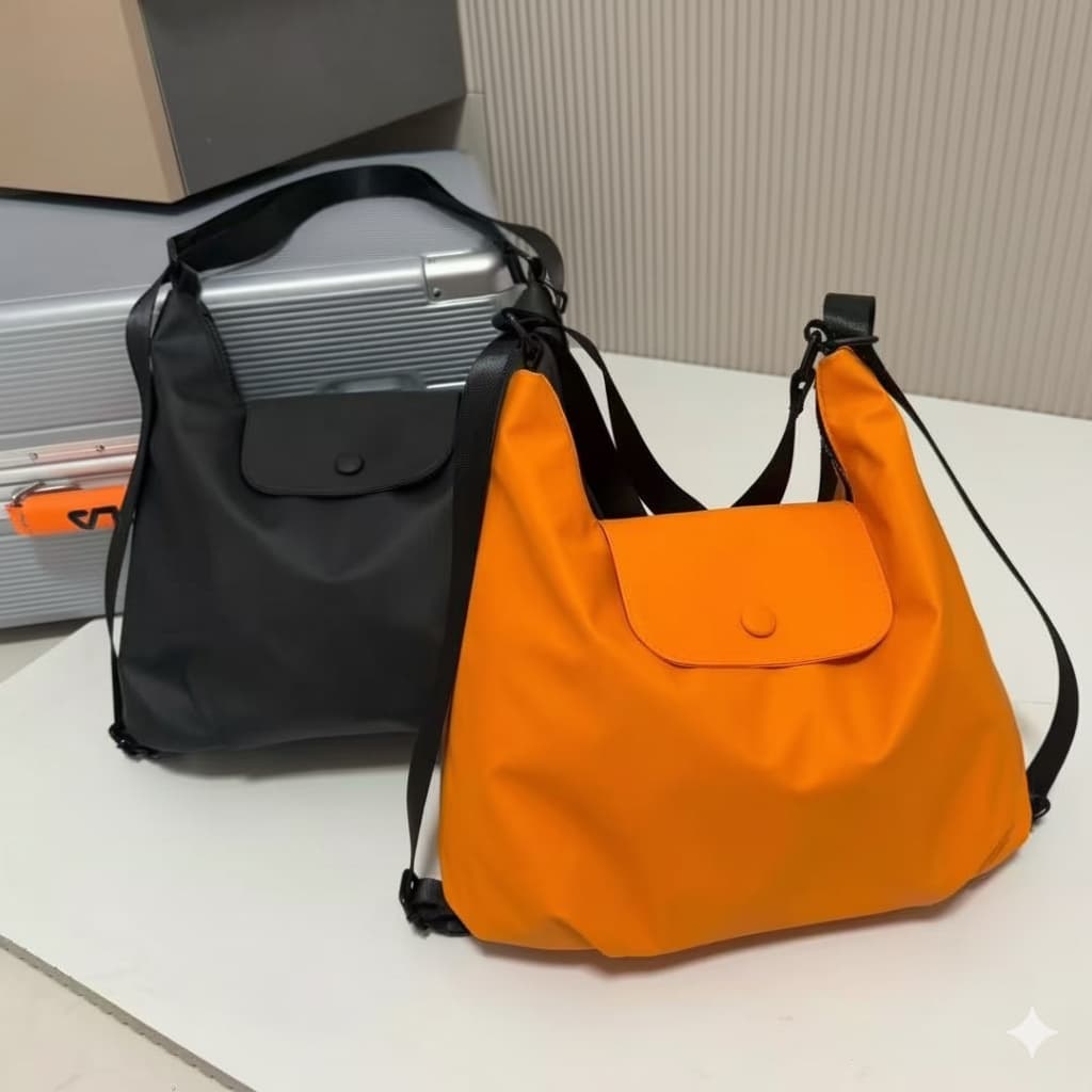 Black and orange bags on a white surface with a neutral background,laptop tote bag for women, tote bag for office use, college tote bag with zipper, and stylish bags for girls. You can also target users with specific needs by using long-tail phrases like vegan leather tote bag or tote bag for daily use in India. To understand the market better, keep an eye on competitors such as Lavie, Baggit, and Caprese, all of which are major players in the Indian handbag space, along with brands like Zouk and Hidesign t