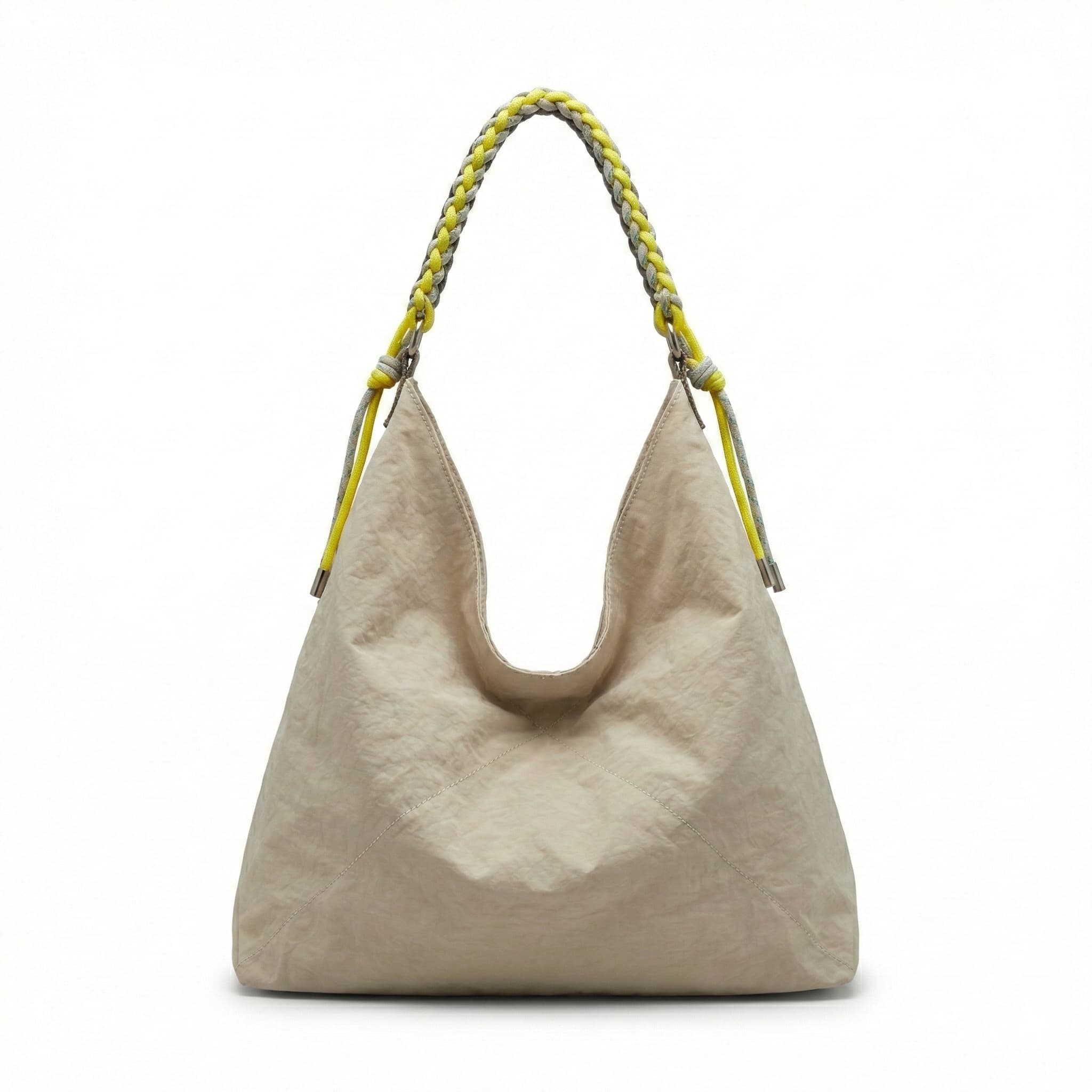 Beige handbag with a braided handle on a white background