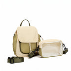A beige and olive green backpack shown with its detachable shoulder strap and a matching beige zippered pouch with a clear front pocket, photographed on a clean white background.