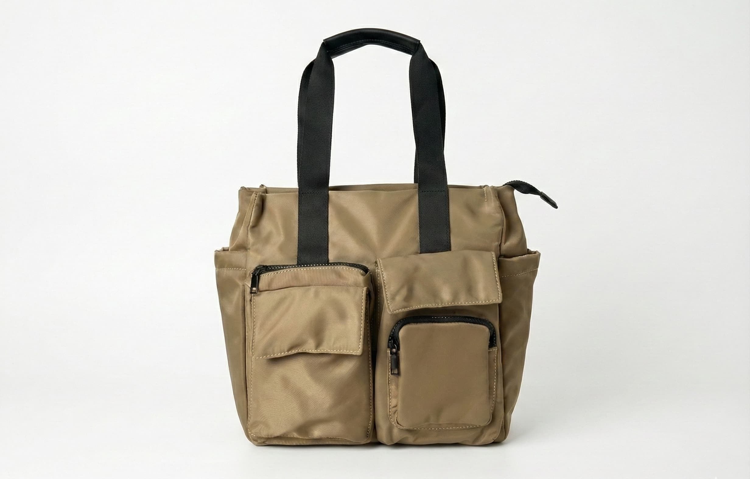 Brown tote bag with black handles on a white background Bag 004 khakhi unisex utility tote bag India in premium heavy canvas with structured everyday carry design, minimalist neutral streetwear aesthetic for men and women, oversized tote bag for office, college and travel use, durable and sustainable cloth tote inspired by Zara and The Souled Store urban fashion collections, modern Indian street style accessory built for practicality, comfort and long term wear.

🌫 BAG 004 – GREY