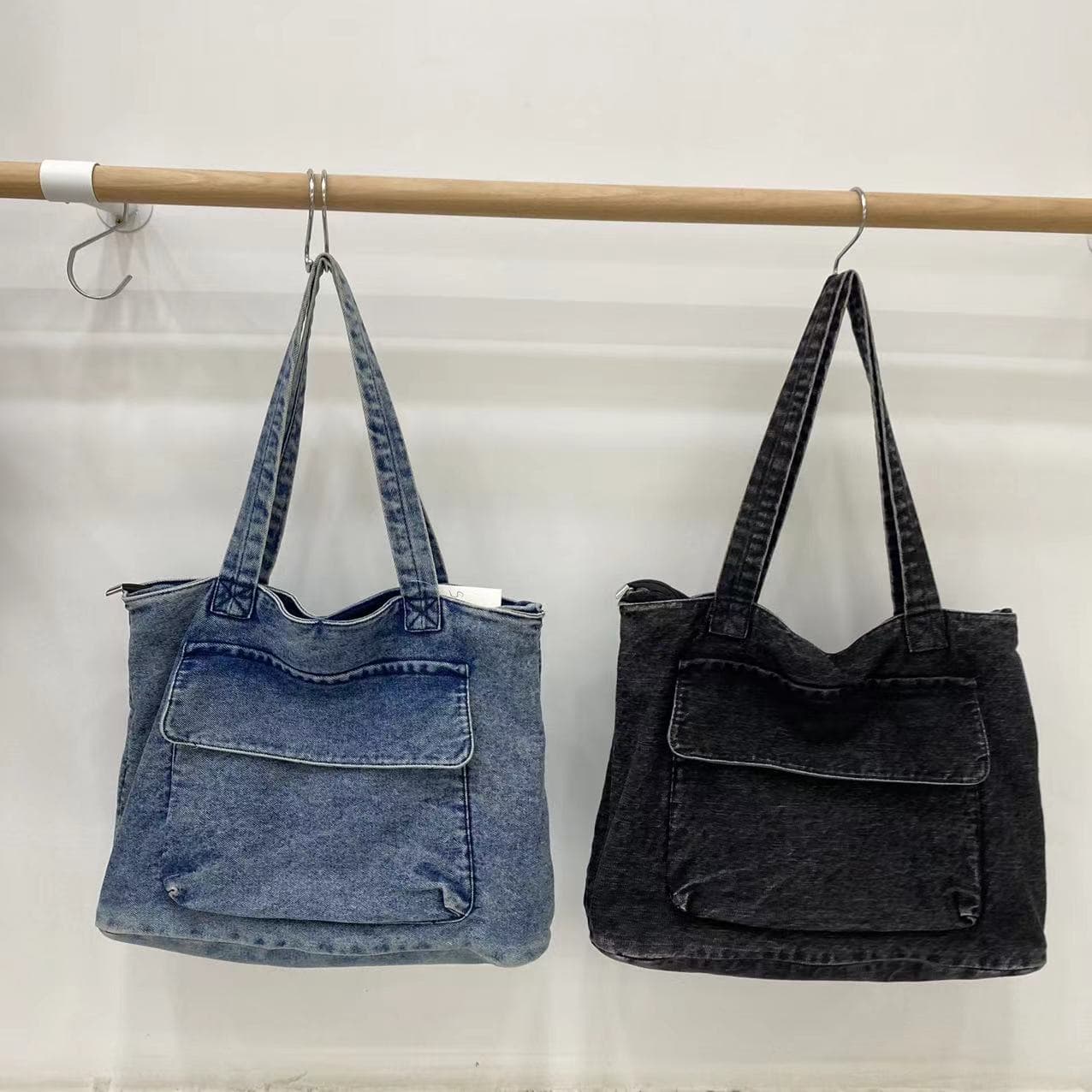 "Stylish denim tote bags with front flap pockets and twin shoulder straps – perfect for casual outings, college, or everyday errands. Made from durable washed denim for a rugged streetwear look with spacious interior and secure zip closure. A versatile and functional carryall from Tales of Totes – redefining everyday fashion bags in India beyond Zouk, DailyObjects, and Chumbak."

