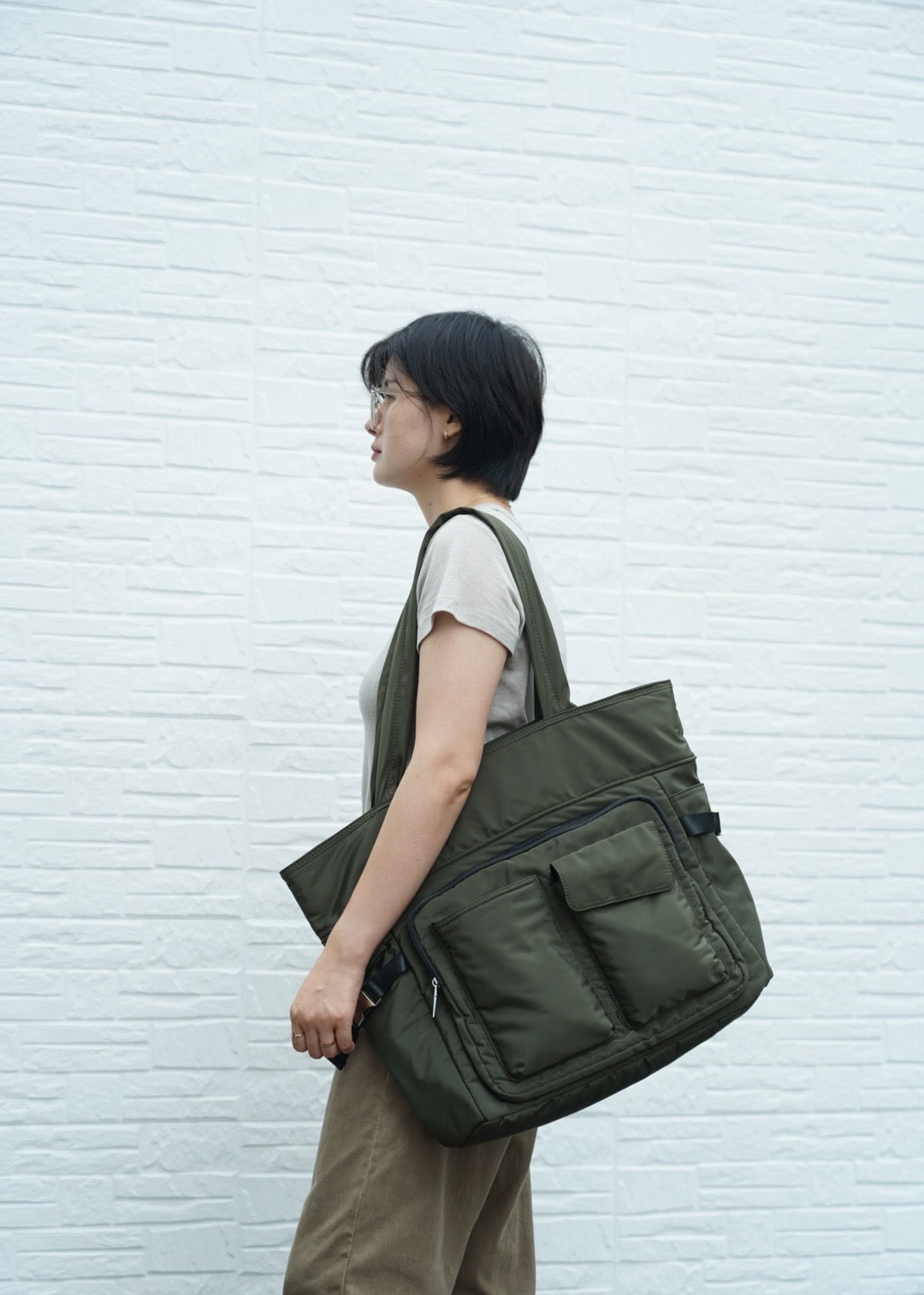 Large utility tote bag with dual front pockets, structured handles, and functional design – perfect for everyday carry, college, or work use. Built for high capacity and easy organization, ideal for Indian shoppers looking for bold, practical fashion. A premium utility essential from Tales of Totes competing with top Indian brands like Zouk, Lavie, and Chumbak."

