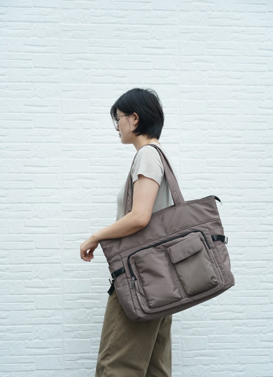 Large utility tote bag with dual front pockets, structured handles, and functional design – perfect for everyday carry, college, or work use. Built for high capacity and easy organization, ideal for Indian shoppers looking for bold, practical fashion. A premium utility essential from Tales of Totes competing with top Indian brands like Zouk, Lavie, and Chumbak."

