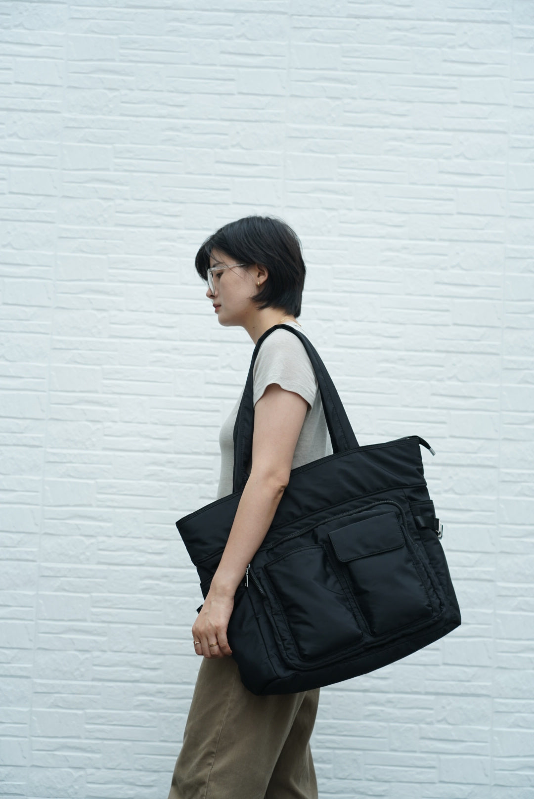 Large utility tote bag with dual front pockets, structured handles, and functional design – perfect for everyday carry, college, or work use. Built for high capacity and easy organization, ideal for Indian shoppers looking for bold, practical fashion. A premium utility essential from Tales of Totes competing with top Indian brands like Zouk, Lavie, and Chumbak."

